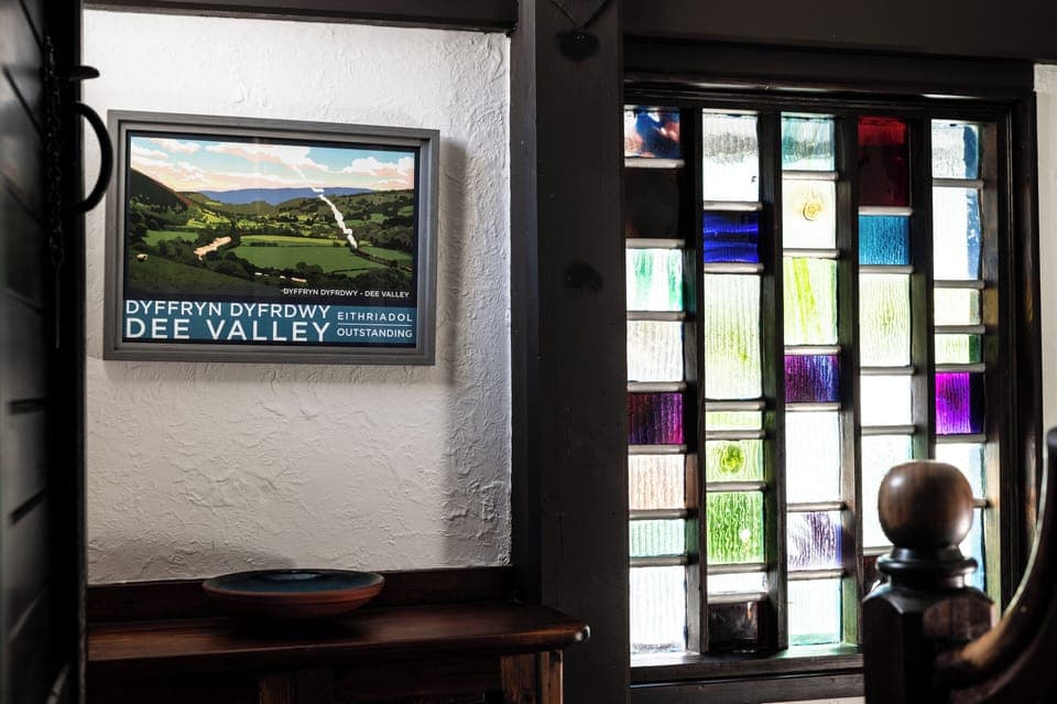 View from the family room door, featuring a reclaimed stained glass window