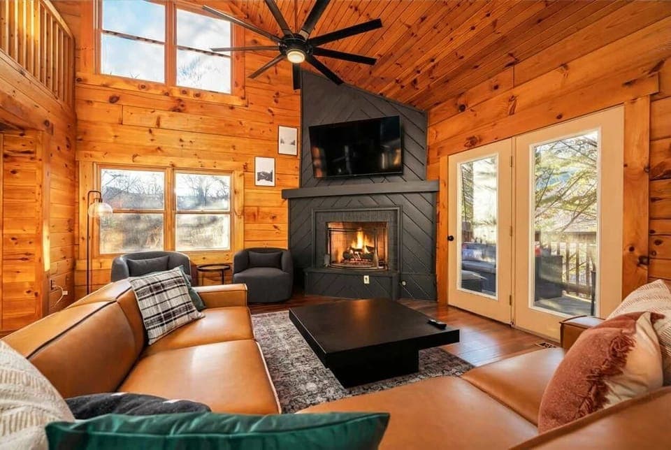 Dining, living, and kitchen spaces flawlessly merge in an open concept design