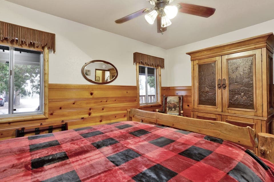Elegant bedroom with stylish furnishings, serene atmosphere, and welcoming design for guests