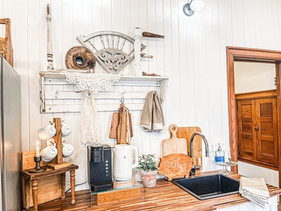 Perfectly curated kitchen with new appliances, and antique decor adds the charm.