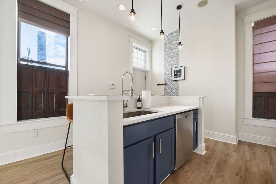 Bright, modern bathroom with vanity, walk-in shower, and designer finishes.