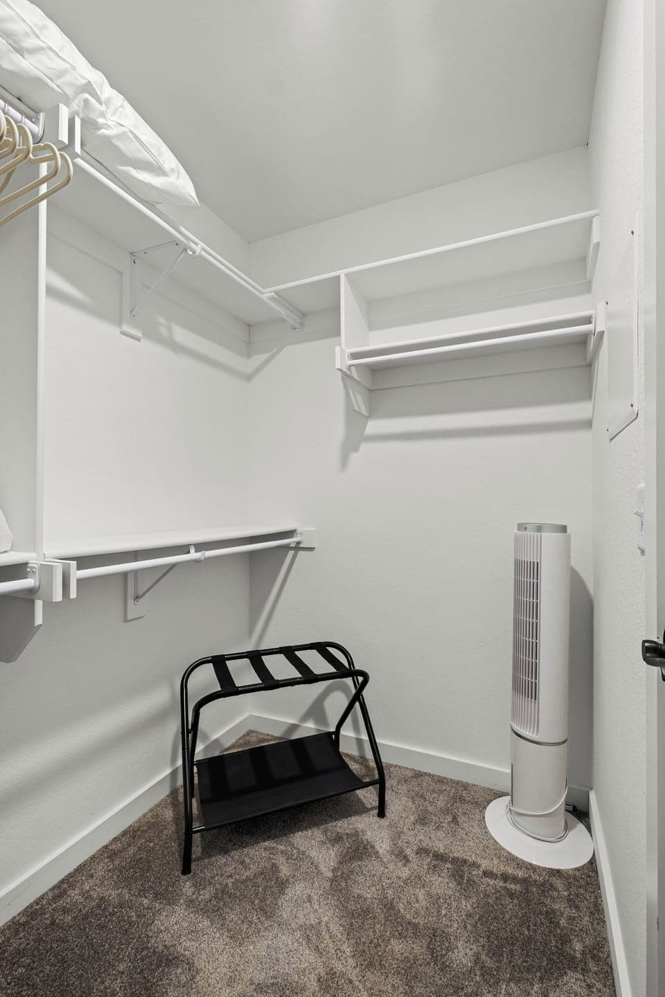 Primary bedroom walk in closet!