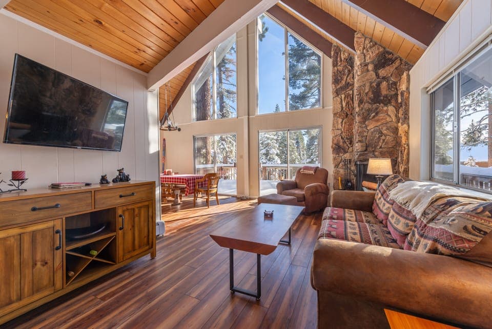 Bright and sunny Living room on Main floor with open beam ceilings