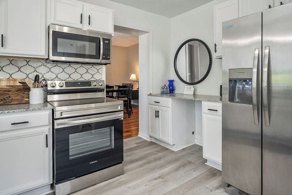 Unit 40: Our kitchen has everything you need to cook delicious meals. The appliances are top-of-the-line, the countertop is sleek and durable, and the kitchen is spacious and well-lit. This kitchen is perfect for entertaining guests or cooking for a 