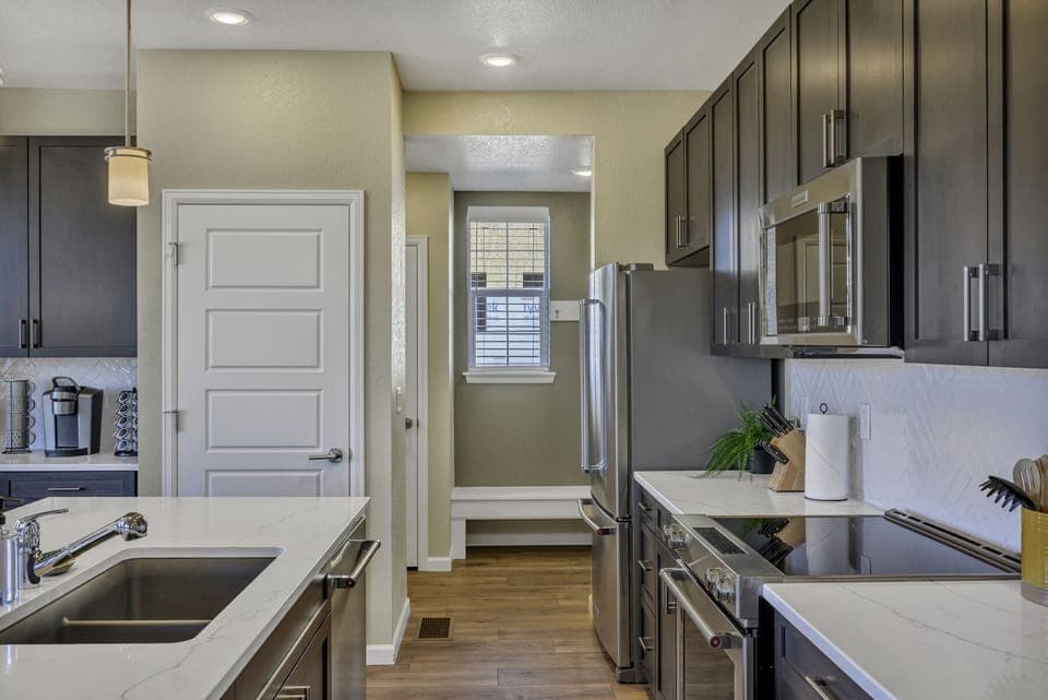 Modern appliances and large sink for the kitchen