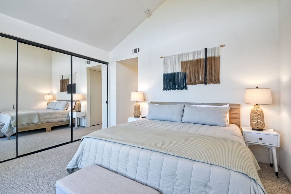 Full-sized closet with dresser and TV