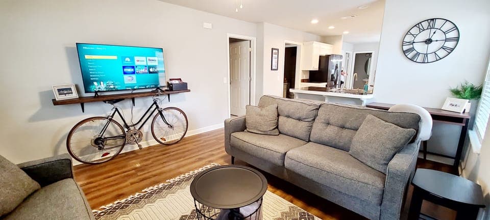 Living room with two couches and Roku TV