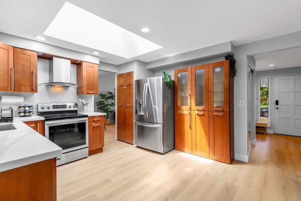 Here is the well equipped kitchen with new wood floor