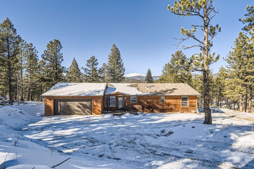 Welcome to our winter haven, where the Airbnb`s exterior is a canvas of snowflakes and ice, creating a perfect backdrop for your chilly season getaway.