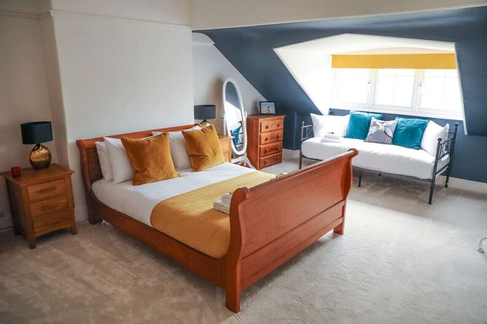 Bedroom 1: the beautiful sleigh bed in this room ensures a comfortable and restful night's sleep for guests.