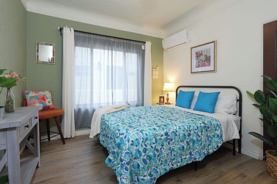 Cozy furnished bedroom.