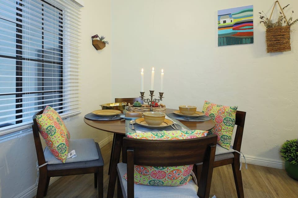 An inviting dining area with a stylish four-seater table
