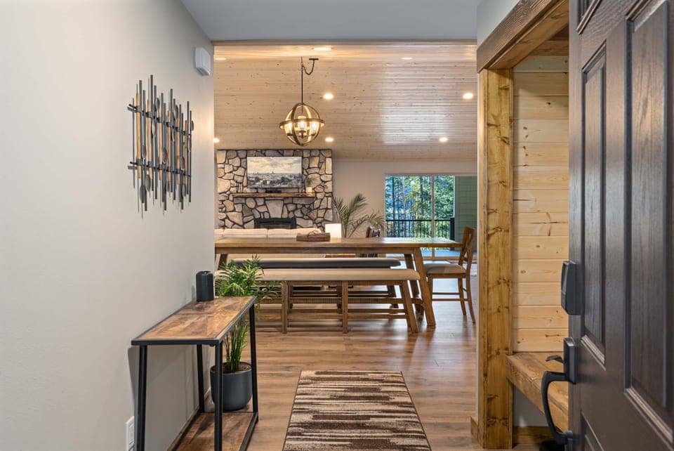 Entry via Smartlock, built in bench with cubbies for shoes, purses, etc. Many coat hooks, and a bench around the corner with more coat hooks.