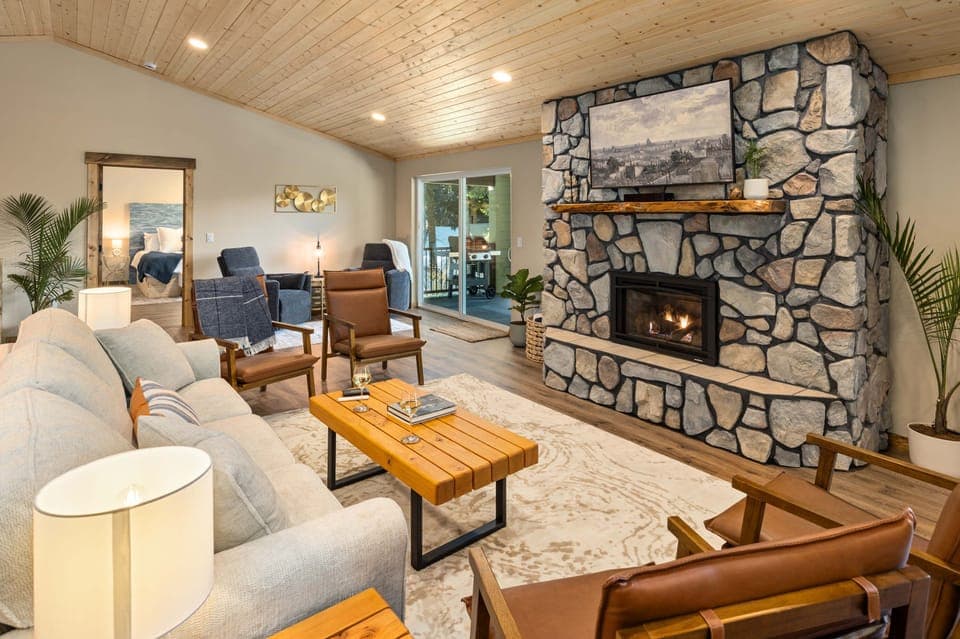 Gorgeous living room with a gas fireplace, Smart TV, and cozy seating.