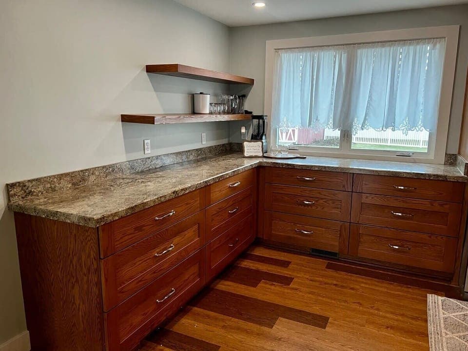 Kitchen Beverage bar with ample storage and counter top space. 