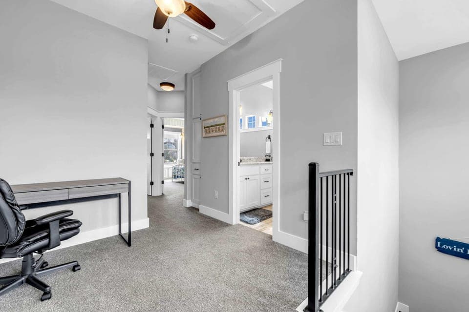 Upstairs loft area has a small work space in case need to catch up on emails while at the lake!