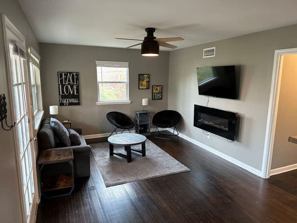 Comfortable living room with TV & cozy seating