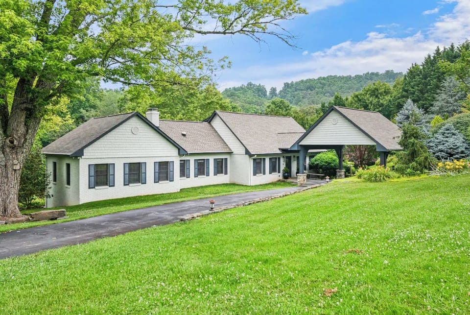Alternate road view highlighting trees and outdoor space.