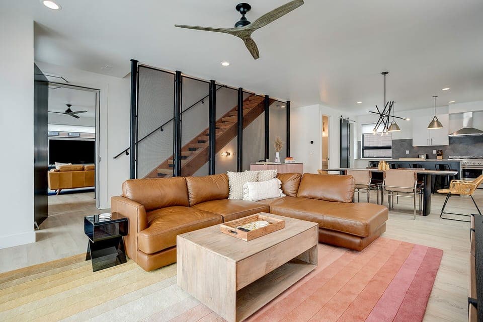Unwind in your stylish living space with rich leather seating and modern design elements that create the perfect atmosphere for relaxation.