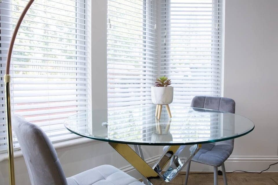 Bay window dining table for two.  Beautiful natural light.