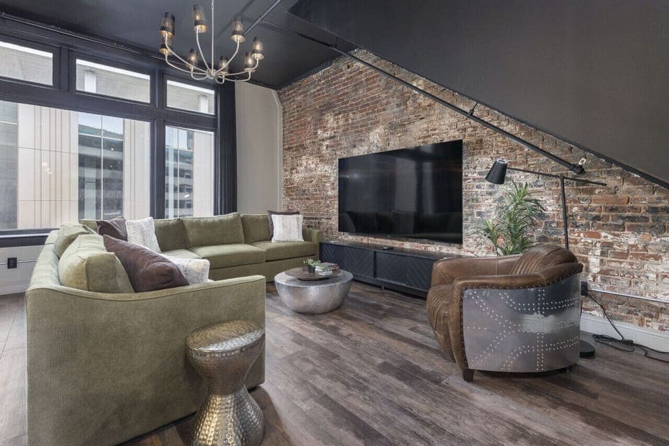 Movie night! Living room area with 85 inch TV and free Wi-Fi. Connect to your favorite app and stream to your heart's content! We have free popcorn!