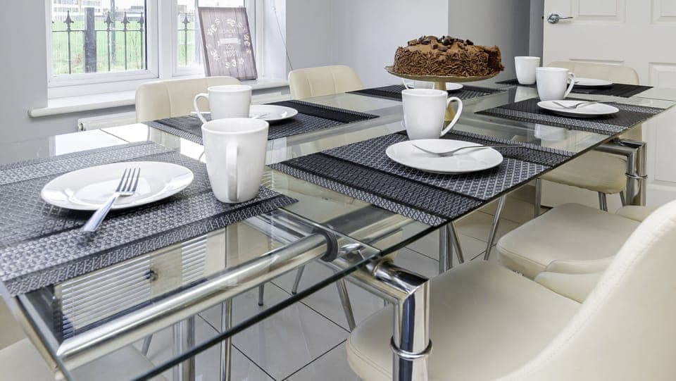 Elegant dining area with seating for everyone, perfect for shared meals and gatherings.

