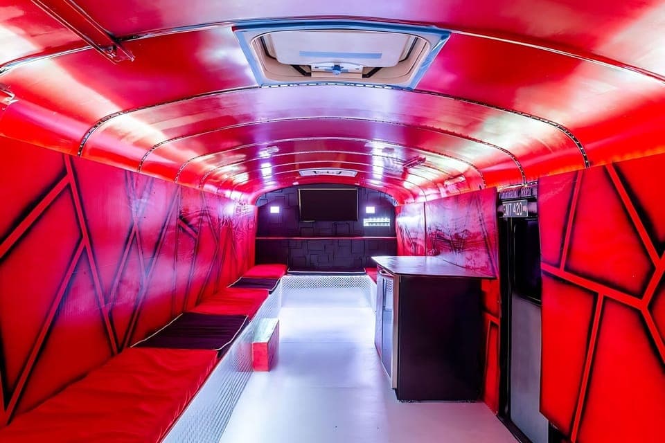 Step Inside This Colorful Converted Bus For A Unique Lounge Experience