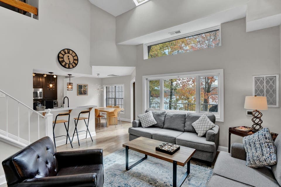 View towards kitchen and dining area from bright and airy living room. Nice view