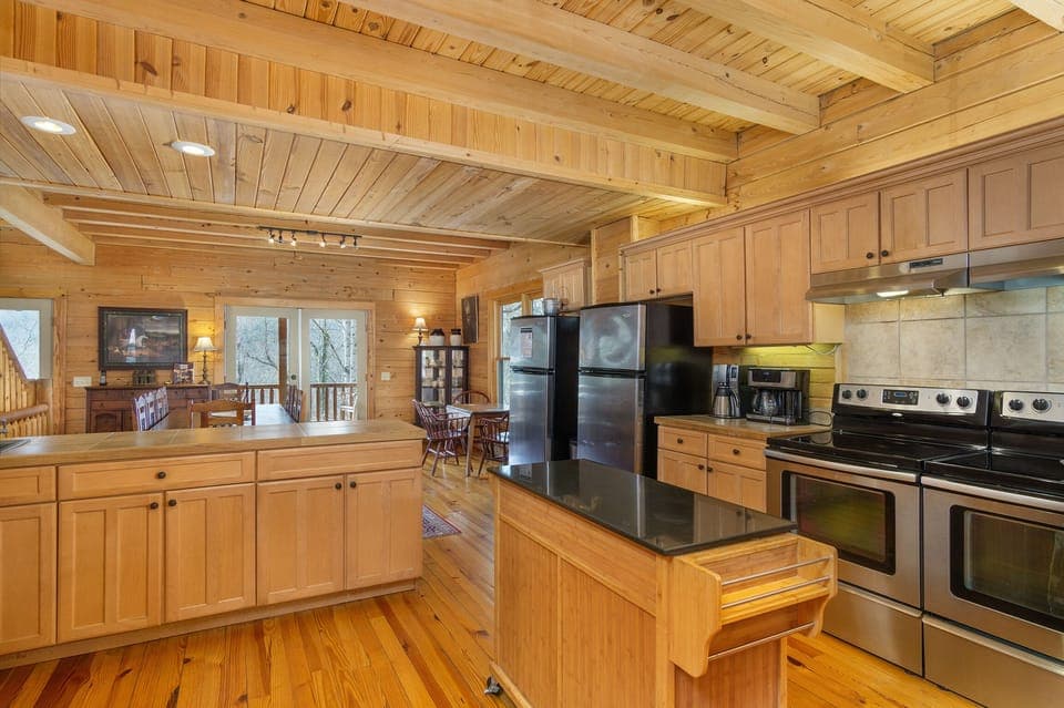 The kitchen is perfect for large groups, with its double ovens, double refrigerators, dishwasher, and drip-style coffeemaker with a Keurig option.