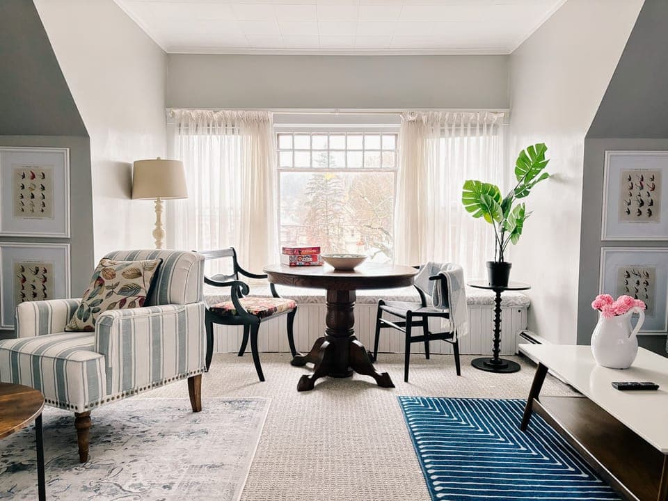 Comfortable 3rd floor living room offers a view of downtown Franklin and 46" TV.