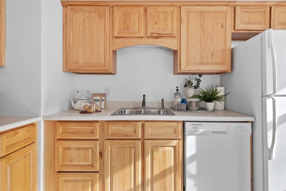 The fully equipped kitchen includes all dining and cookware provided.