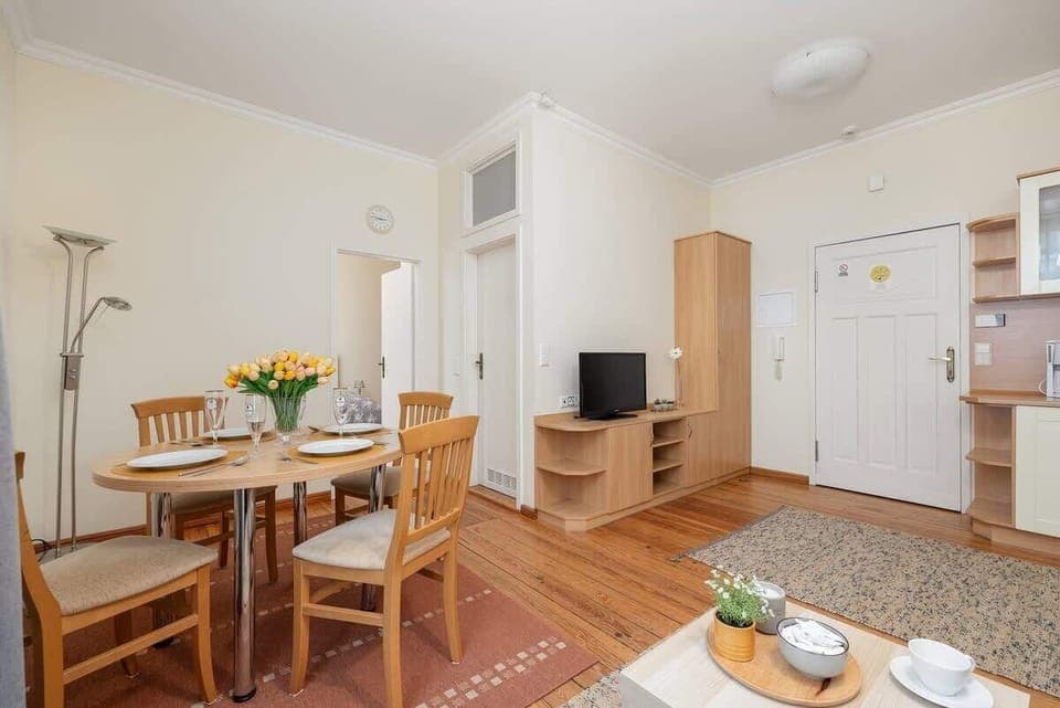 A well-arranged dining space with a table set for meals, combining functionality with aesthetics.
