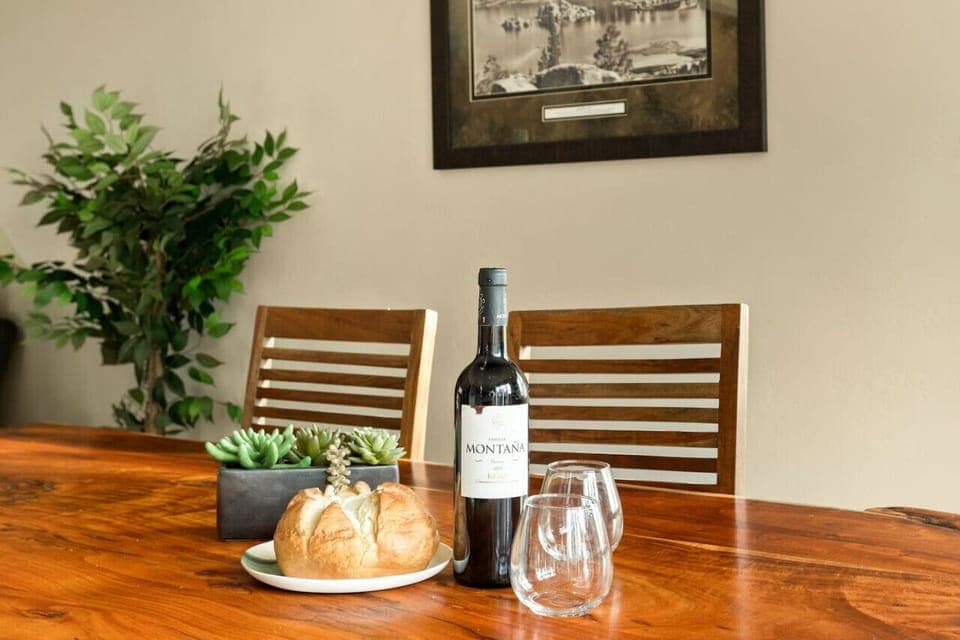 Break bread at our all-wood dining room bench style table.