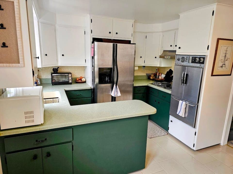 Kitchen with functioning antique oven and stove