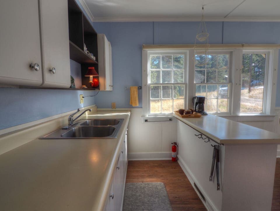 Another view of the sun-filled kitchen and its ample counterspace.