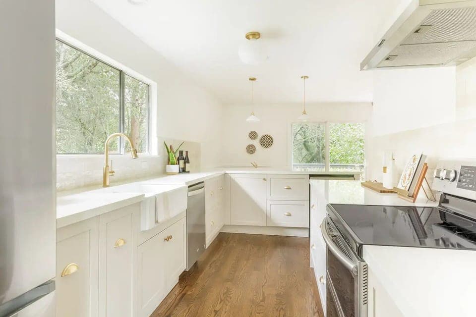 Floor 1, New kitchen with full-size stainless steel appliances & quartz counters