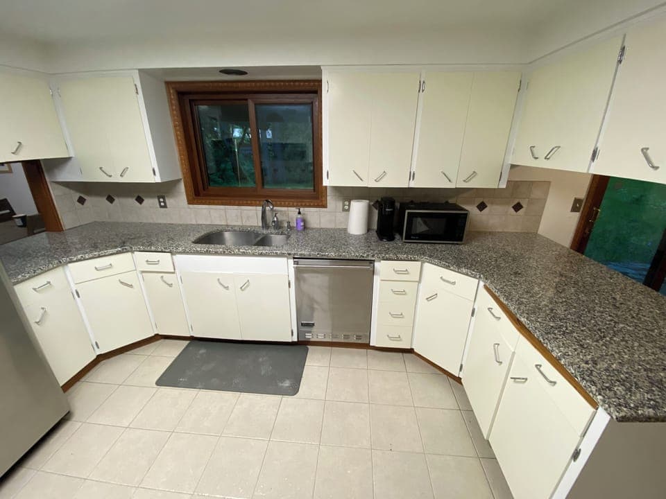 Kitchen with Table Top Microwave and Keurig