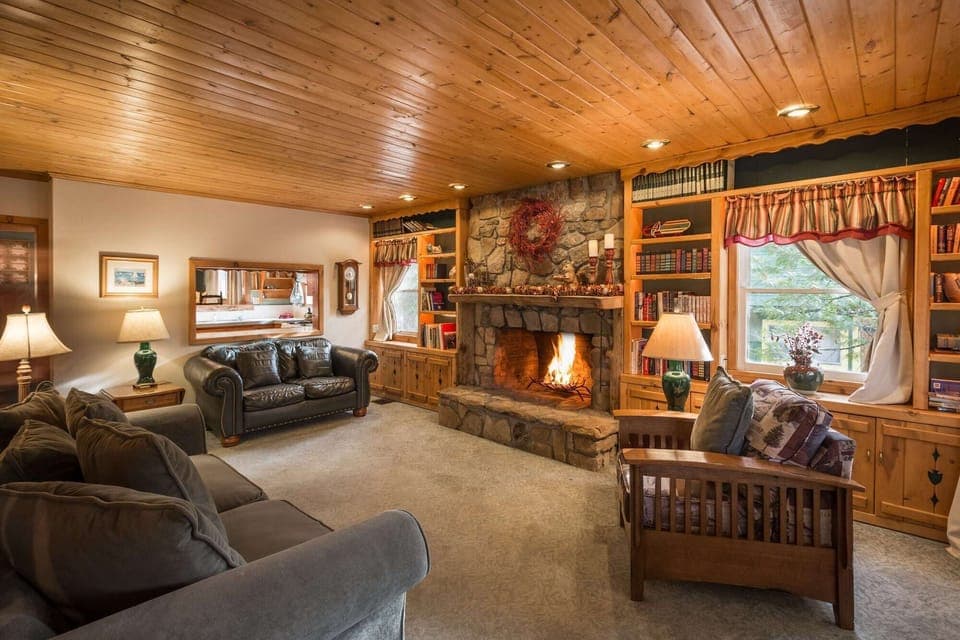 Entry living room with real wood-burning fireplace