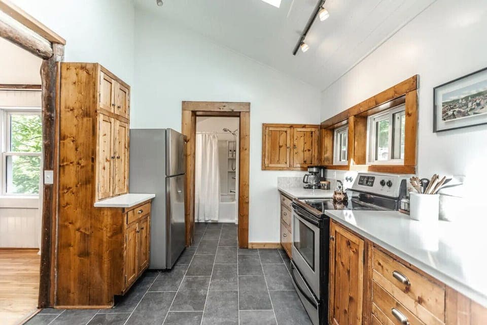 A full, spacious kitchen in the lodge is perfect for large groups and cooking for and hosting guests.