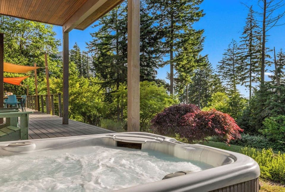 Forest views, crisp air, and your own private hot tub—relaxation comes standard.