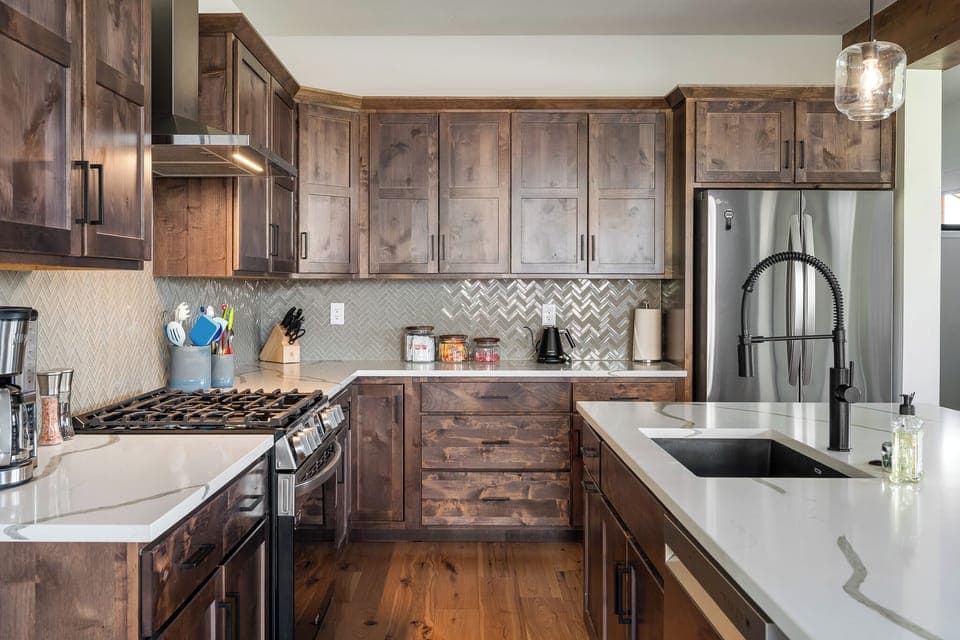 Fully-stocked kitchen with dishwasher, microwave, coffee maker, blender, etc.