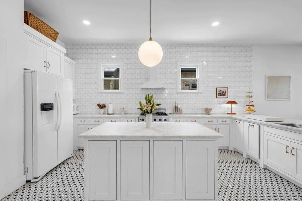 This elegant kitchen is fully stocked for all your culinary needs!