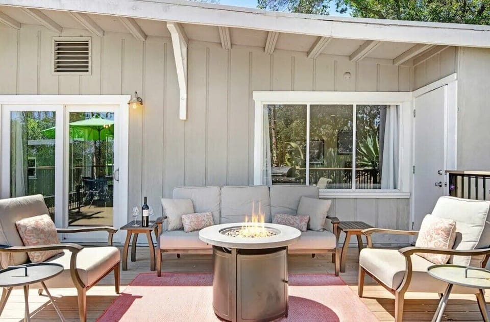 Enjoy a glass of wine with friends & family around the firepit.