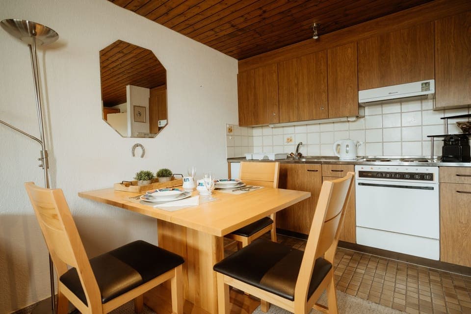 Dining table and kitchen