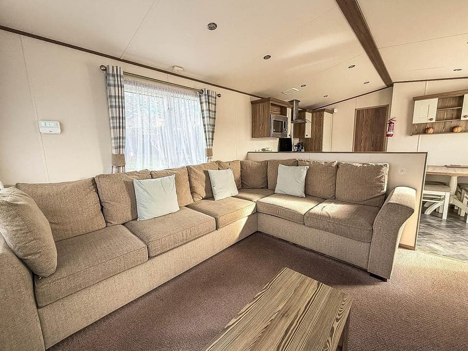 Cozy living room with plush seating and natural light