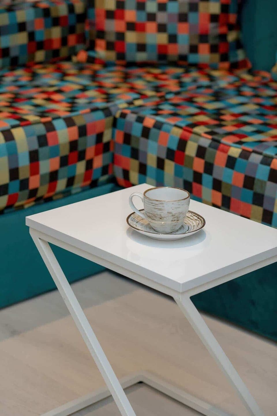 A coffee table with a neatly arranged coffee set, adding a touch of luxury and comfort.

