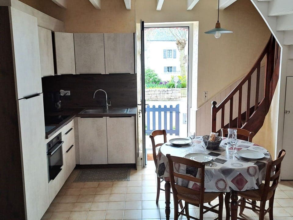 Furniture, Wood, Flooring, Floor, Interior Design, Kitchen, Countertop, Kitchen & Dining Room Table, Chair, Home