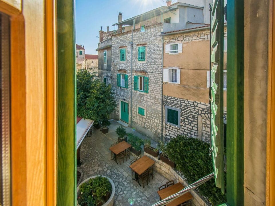Green, Property, House, Neighbourhood, Building, Real Estate, Yellow, Town, Architecture, Window