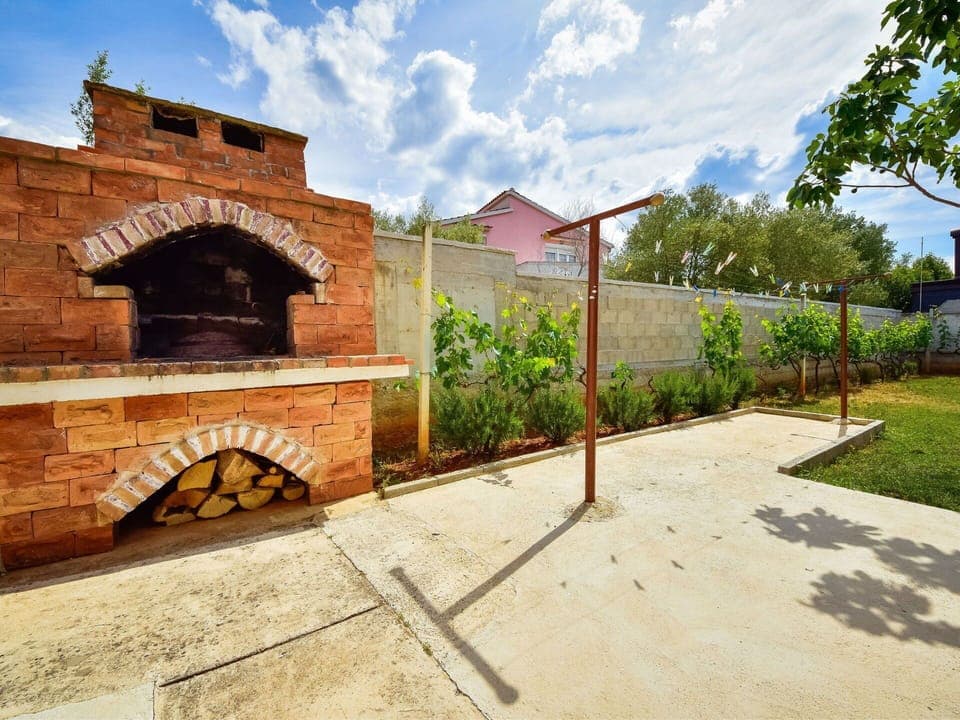 Sky, Cloud, Plant, Property, Building, Road Surface, Shade, Tree, Brick, Residential Area