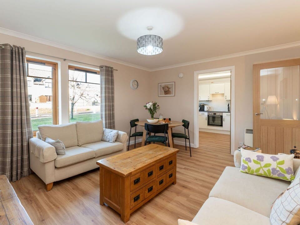 Furniture, Interior Design, Flooring, Wood, Couch, Floor, Ceiling, Room, Table, Living Room